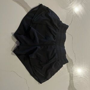 Lululemon hottie hots, black, 2.5 inch Inseam size 0. Very good condition!